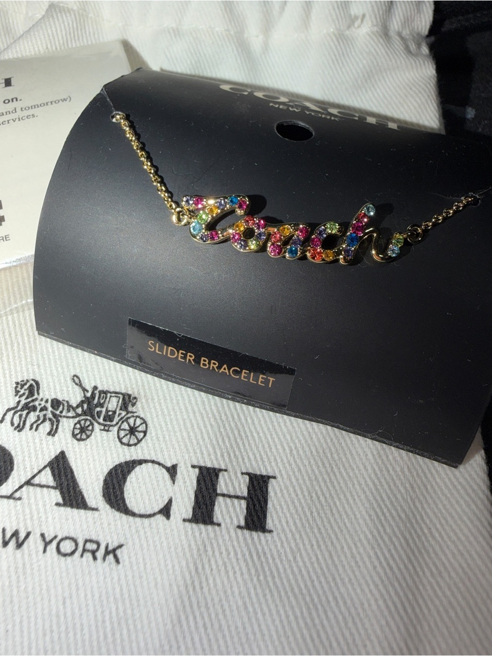 NWT COACH Rainbow Pavé Crystal Cursive Script Logo Slider Bracelet Gold